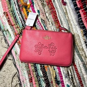 Minnie and Mickey Mouse coach Wristlet